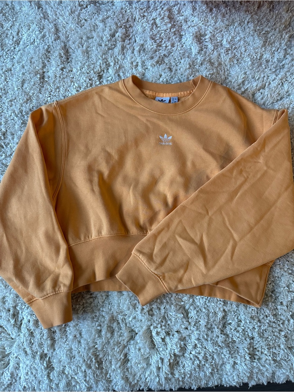 adidas women’s Light Orange Crewneck Cropped Sweatshirt